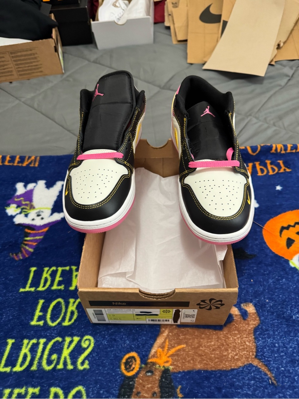 Men’s Jordan 1 Low-Top Sneakers in Black, White & Pink